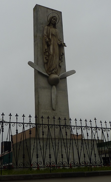 The virgin Mary standing on a wind turbine in San Jose