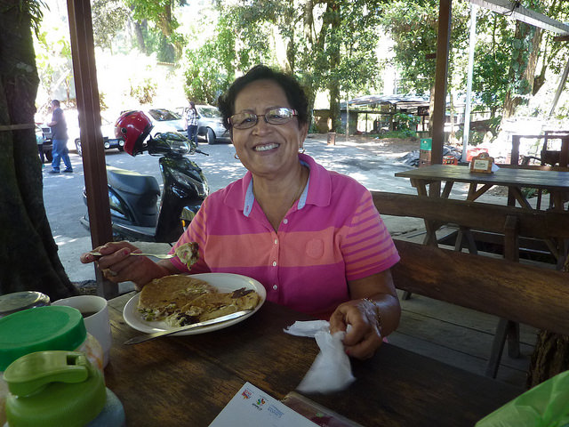 Amanda eating pupusas