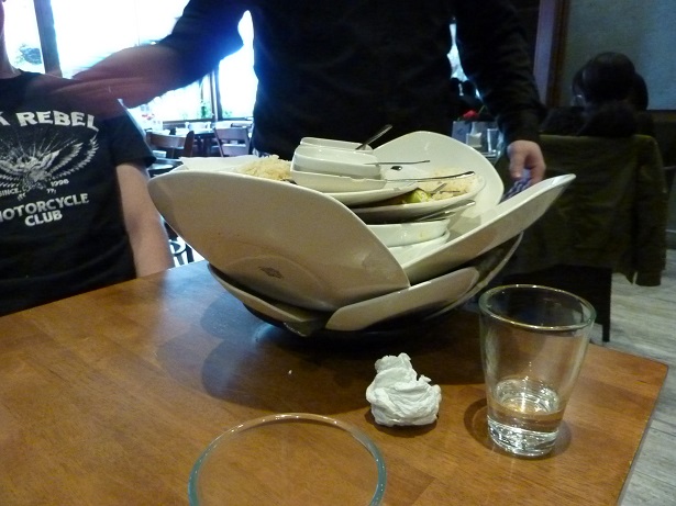 This is how a real man clears away the dirty plates - awesome.